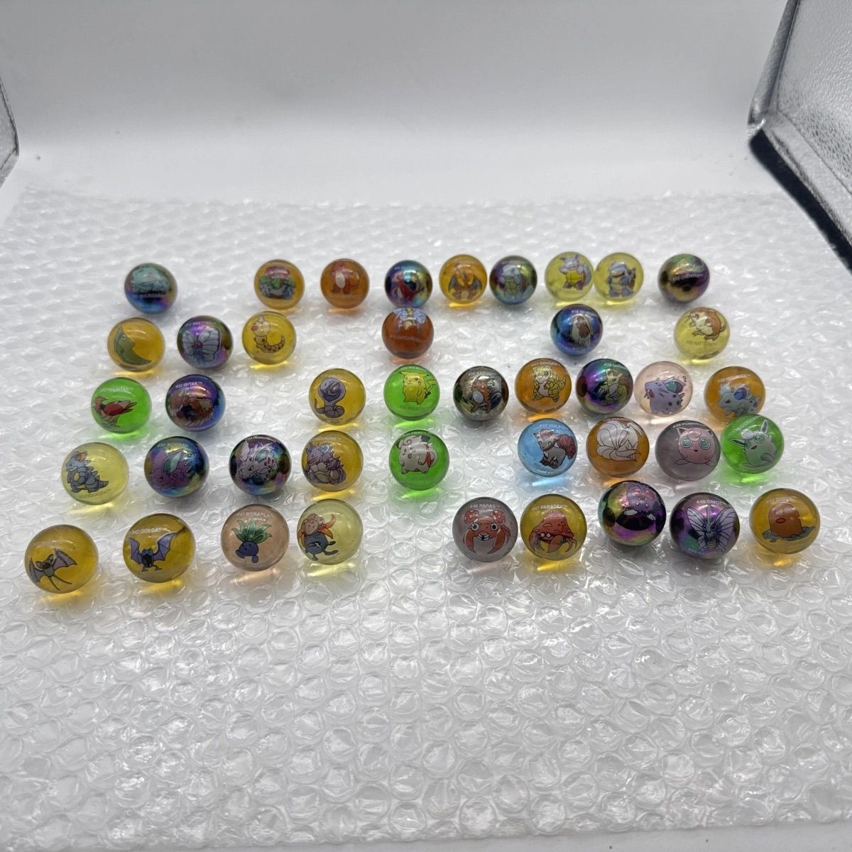 สินค้าลิขสิทธิ์แท้ของโปเกมอน,  - Vintage Collectible Marbles บทวิจารณ์และราคา